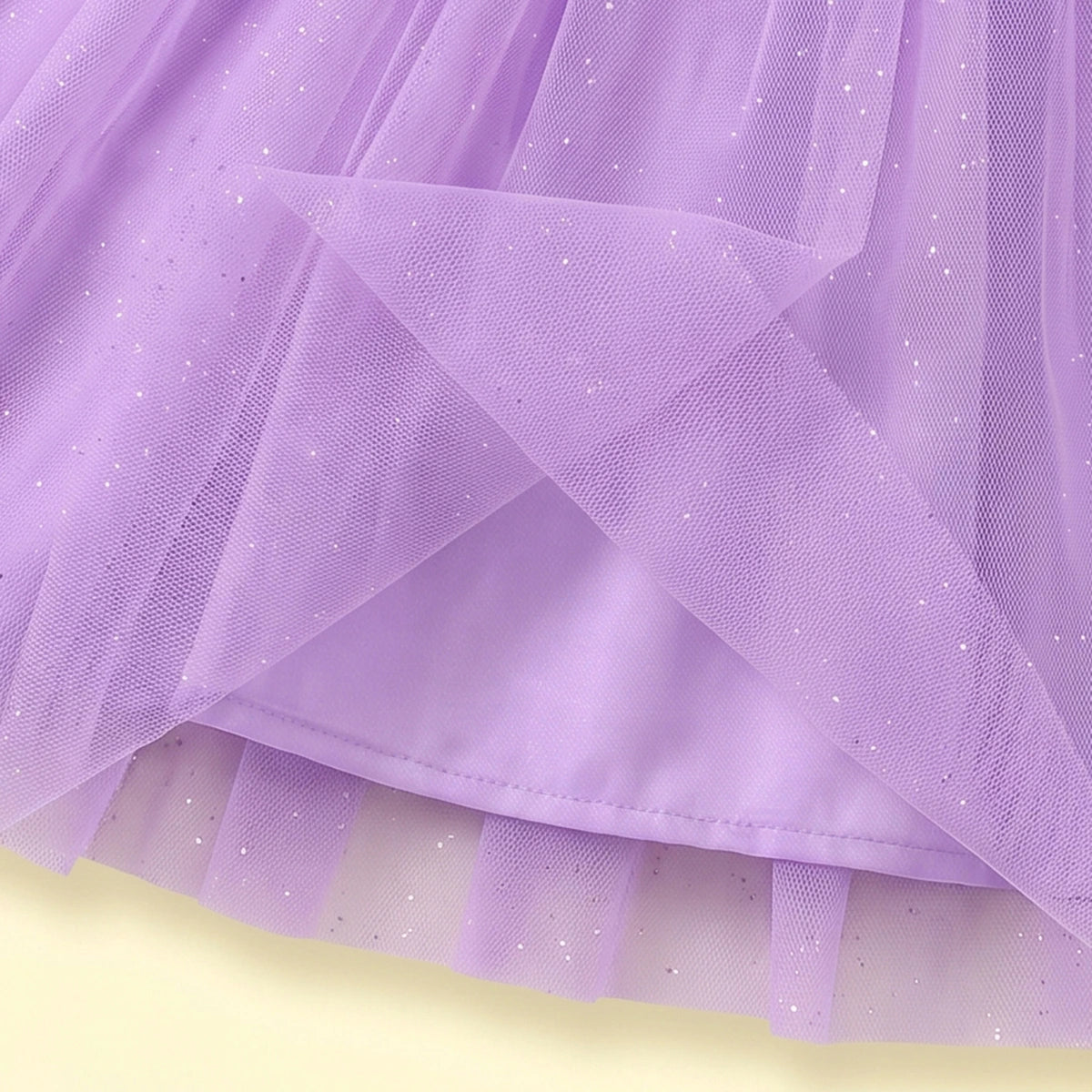 Girls purple sleeveless party gown with floral applique and tulle